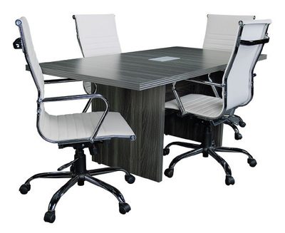 A boardroom table with six meeting chairs.